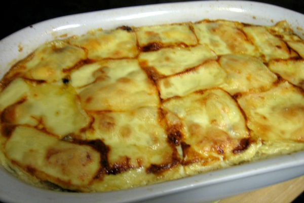Gratin d'endives au poulet et fromage à raclette